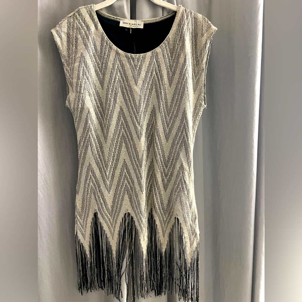 NWT sparkly champagne colored top with fringe bottom